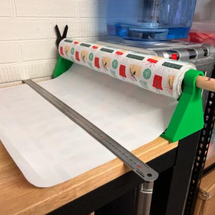 Wrapping paper roll bracket