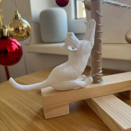Cat on christmas tree ornament